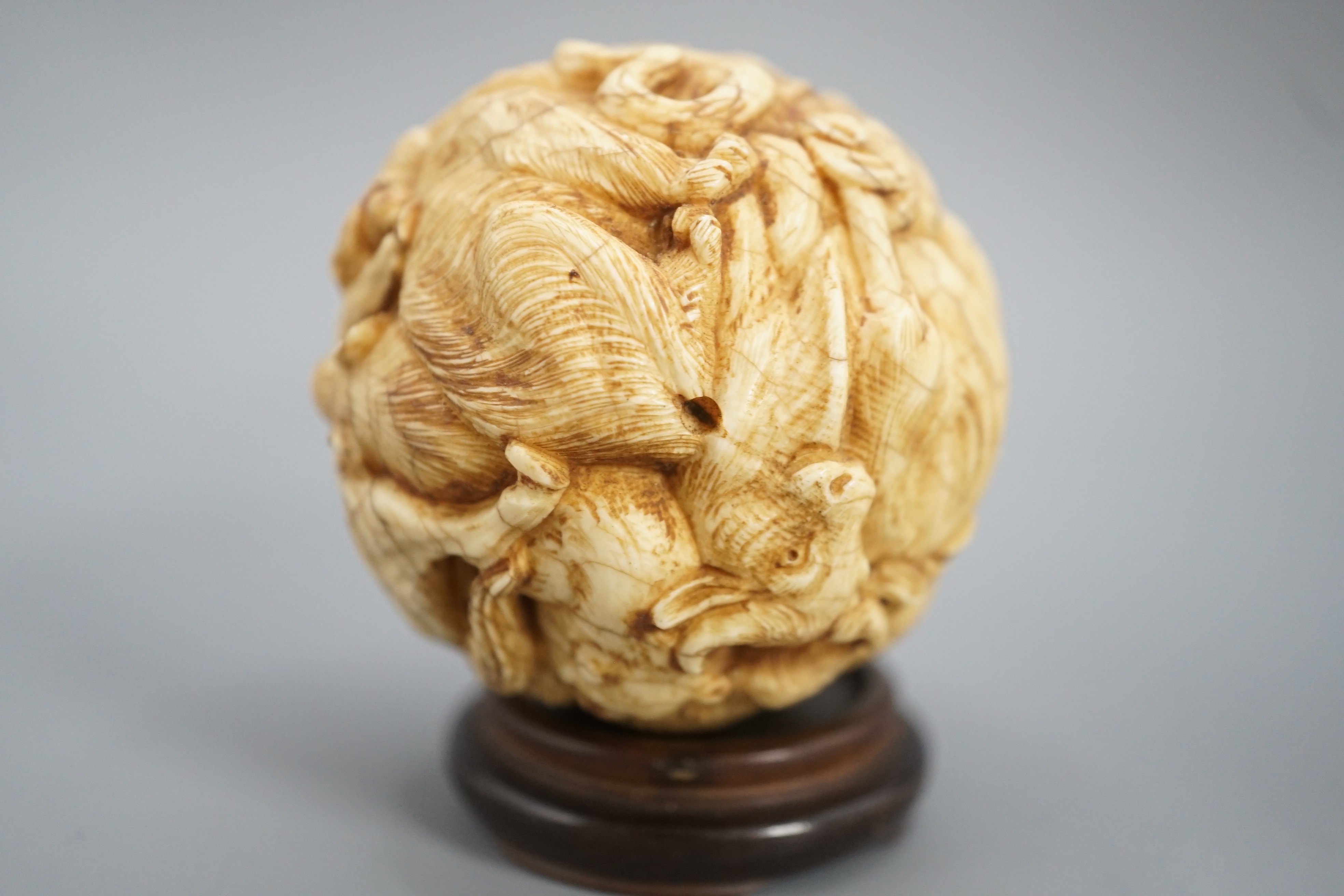 A Japanese ivory ‘Zodiac animal’ ball, early 20th century, 5cm